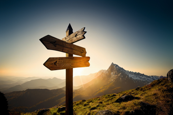 3 Signs on post in the mountains