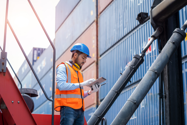 Construction worker analyzing paper